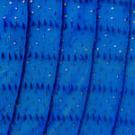 Berber traditional blue wool carpet with geometric pattern in a