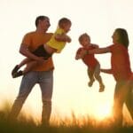 15 Fun Things to Do When You're Bored Happy Family Play In The Park With Children. Mom And Dad Bathe C