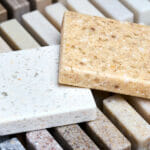 Porcelain Two Stoneware Square Samples Laid On Kitchen Counterto