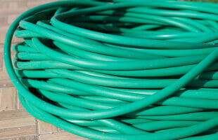 DIY garden hose reel projects for a custom outdoor space