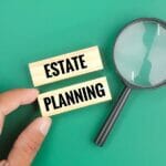 Magnifying Glass With The Word Estate Planning. Estate Planning