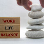 Work Life Balance Text On Wooden Blocks With Balanced White Ston