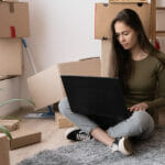 Happy Girl With Boxes Moves To New Apartment, Moving To A New Ho