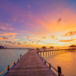 Stunning Colorful Sunset Sky With Clouds Seaside Horizon. Lagoon