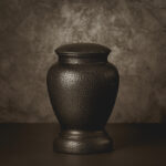 What Should You Do With Cremation Ashes? Cremation Urn With Warm Toning And Copy Space