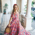 Boho girl in maxi dress and straw hat walking on the Asia city s