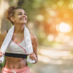 A comprehensive guide to achieving holistic health. Portrait Young Attractive Smiling Fit Woman With White Towel Res