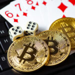 The Future of Sports Betting: How Cryptocurrency is Changing the Game Bitcoins, Cards, Dices On Wooden Background. Cryptocurrencie Gam