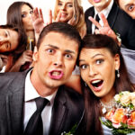Capture & Relive: Crafting Immersive Experiences with Snappic’s Photo Booth Software Bride and groom in photo-booth. Wedding.