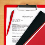 Medical report on a red holder