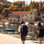 Fashion Meets Function: Designing Your Backpack for Maximum Impact Young freelancing photographers enjoying traveling and backpacki