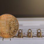 The Intersection of Cryptocurrency and Cybersecurity Bitcoin, Cryptocurrency With Locks On White Keyboard. Cryptocurr