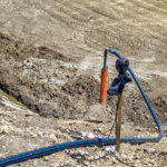 Ensuring Project Success: The Key to Effective Dewatering Design Dewatering Construction Site. Pumping Water Out Of The Construct