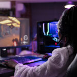 Female Streamer Having Fun With Video Games Online Play, Playing