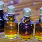 Four Maple Syrup Bottles