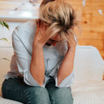 Lonely, Upset Middle-aged Caucasian Woman With Her Head Clasped