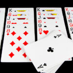 The Rise of ‘Solitaire Free’ Apps in the Self-Care and Mental Wellness Space Playing Cards Game On Black Background