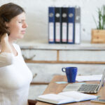 Natural Remedies: How to Relieve Stiff Neck Pain Effectively Young Office Woman Feeling Pain In The Neck