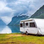 The Ultimate Guide to Choosing and Using an RV Car Hauler for Your Adventures Family vacation travel RV, holiday trip in motorhome, Caravan ca