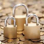 Shrouded in Secrecy: The Enigma of Privacy Coins Financial security. Golden coins and padlocks.
