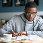 How to Use Mind Maps for Exam Preparation and Essay Planning Focused Millennial African American Student In Glasses Making No