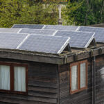 The Advantages of Battery Storage in Off-Grid Solar Systems Houseboat With Solar Panels On The Roof