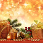Christmas gift with decoration on color background.