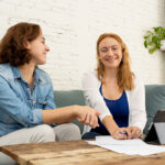 Heath Coach Therapist Working With Client In Life Habits Changes
