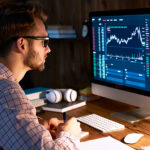 Serious Business Man Trader Analyst Looking At Computer Monitor,